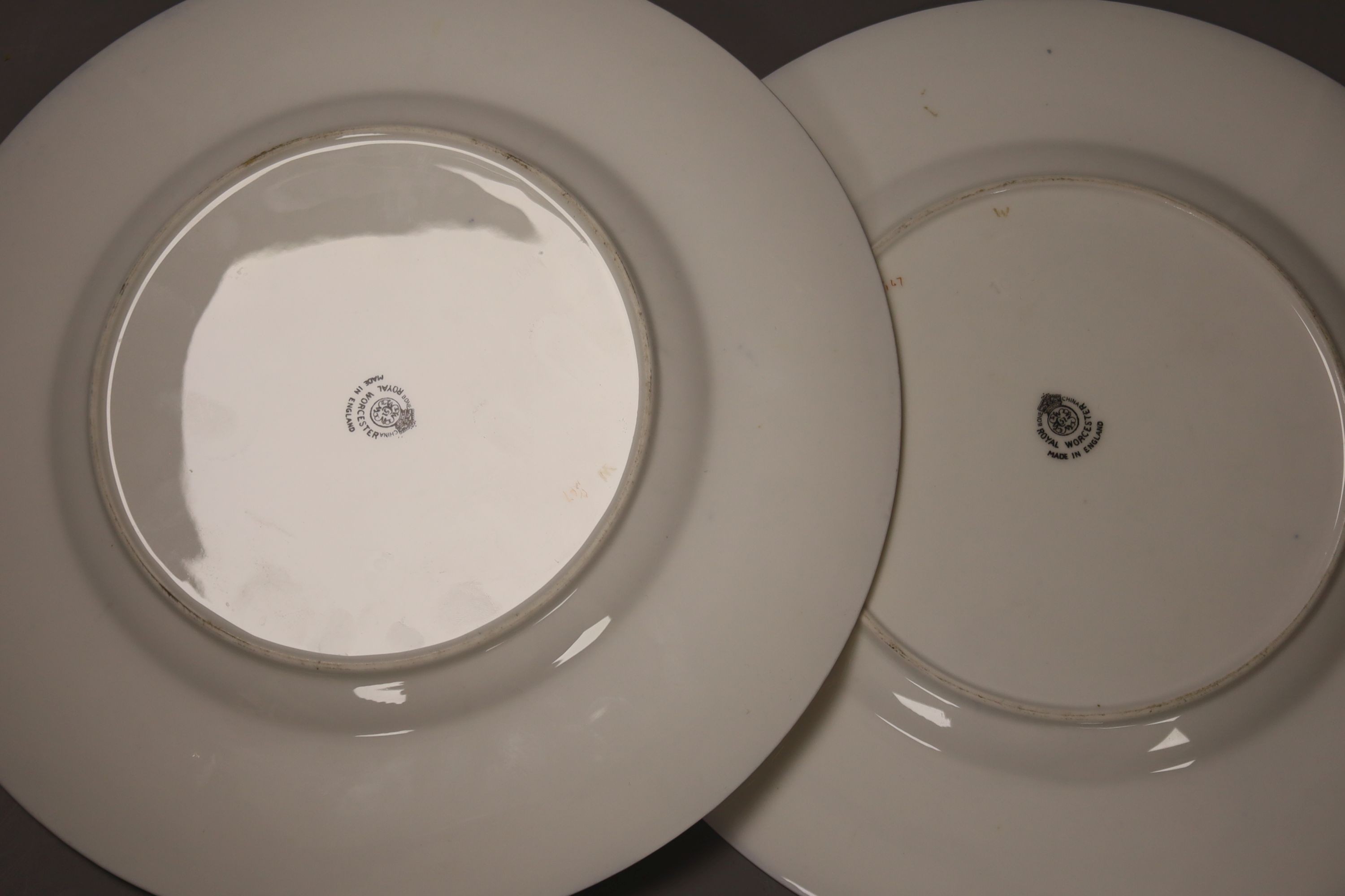 A group of hand-painted and other 19th century and later plates to include examples by Royal Worcester, George Jones, Royal Crown Derby, etc (18)